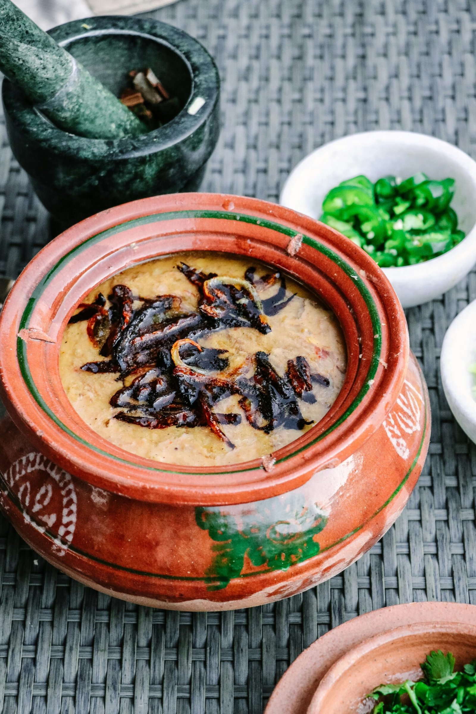 brown and black dish in ceramic pot